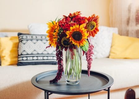 Vase of sunflowers on coffee table